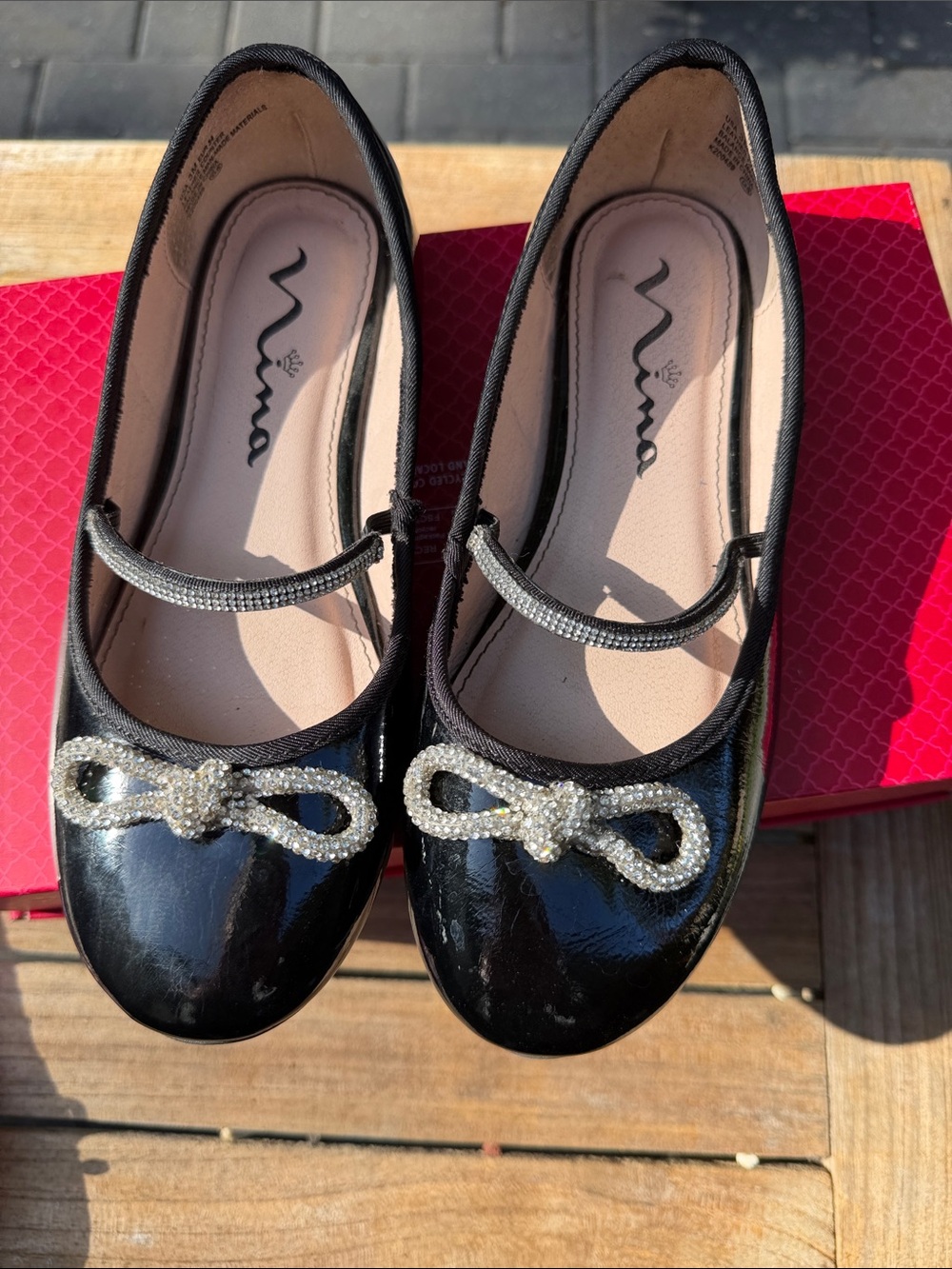 Nina Black Patent Mary Jane Flats with Crystal Bow Accent